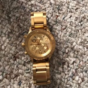Nixon gold women’s watch